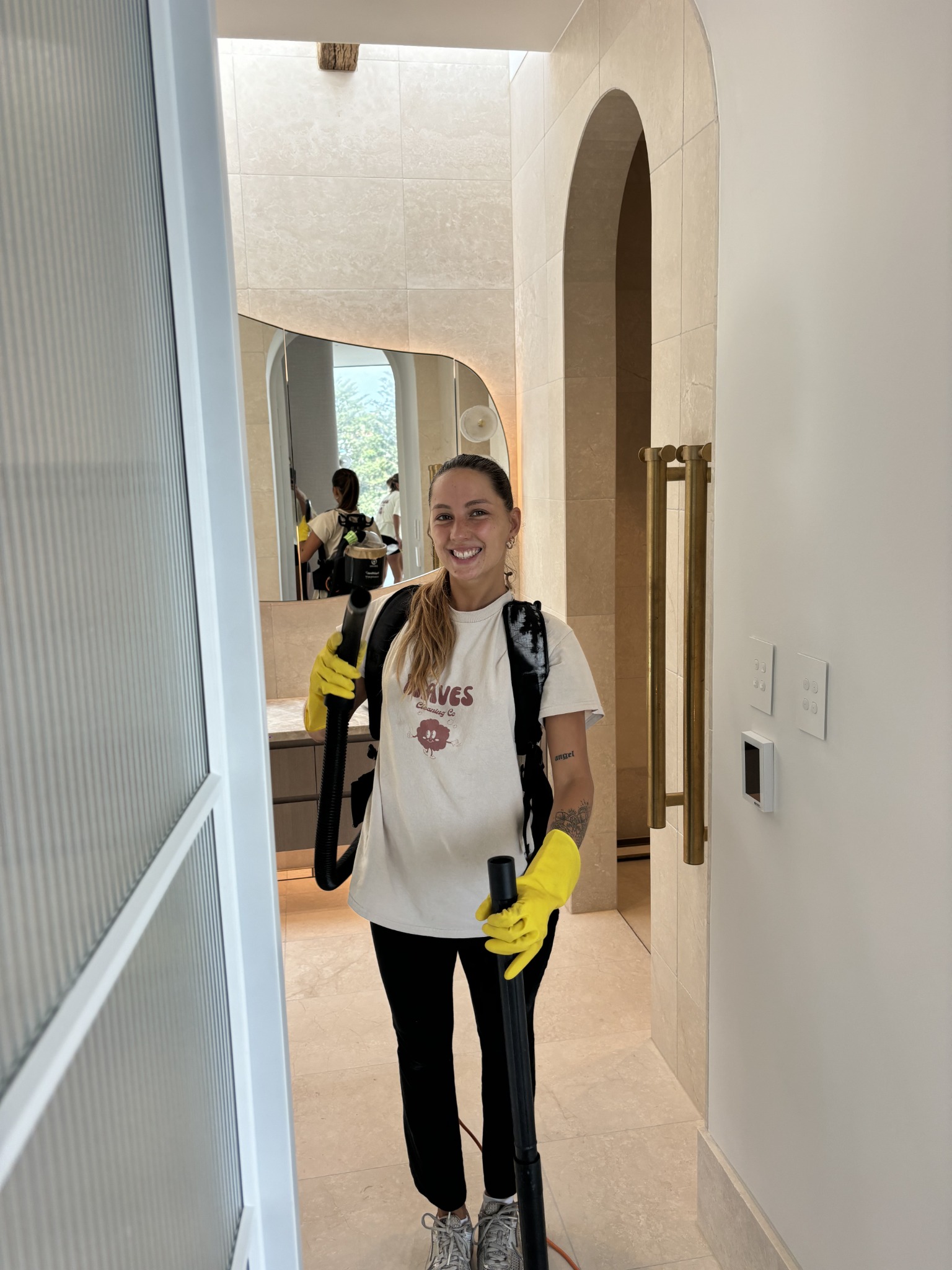 Waves team member on a residential construction clean